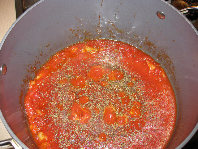 Step three:  Add the spices to the sauce. 