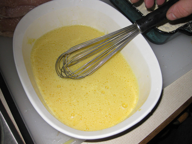 Whisking the egg mixture.