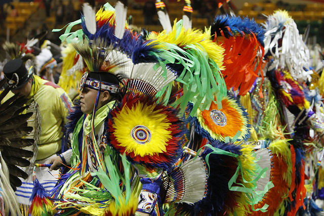Colourful dancers at powwow competition.