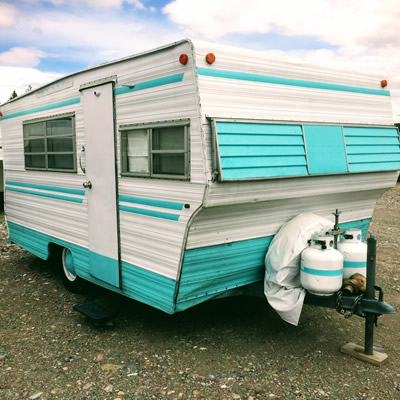 1960 Aristocrat trailer, painted aqua blue and white. 