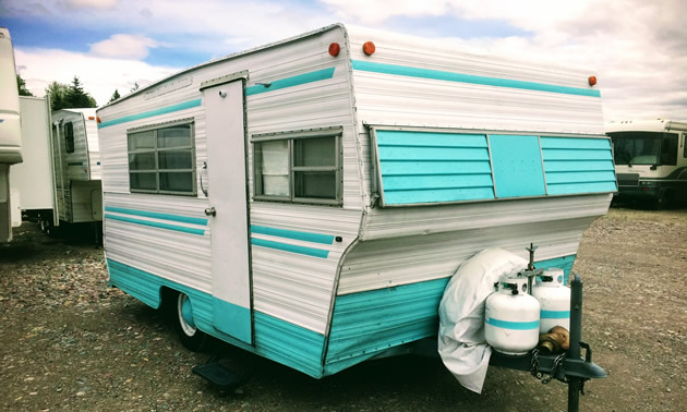 1960 Aristocrat trailer, painted aqua blue and white. 