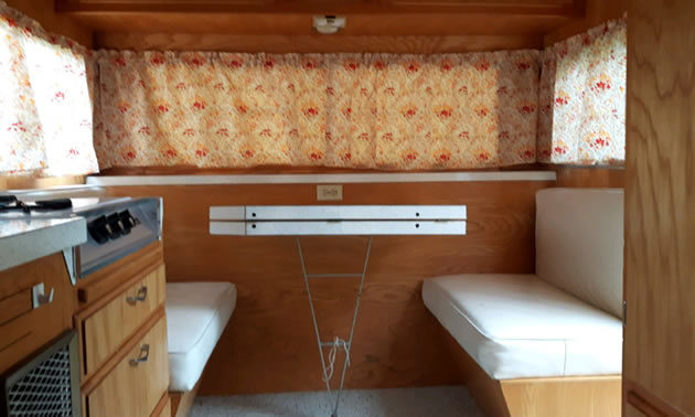 Interior of trailer, showing seating.