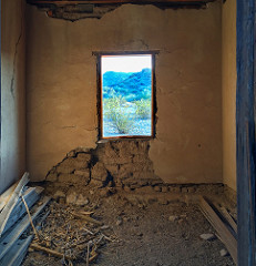 Looking out the window of one of the ruined miners' cottages