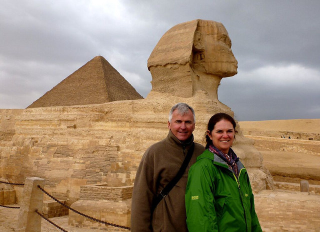 One of the sphinxes of Egypt — and two eager visitors.