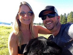 Dave Barton and Anne Bovon with their lab dog. 