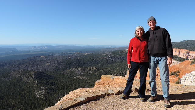 Kevin and Ruth Read standing on the top of an outcropping. 