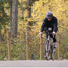 Cyclist enjoying the Community Trail in Fort Nelson, BC