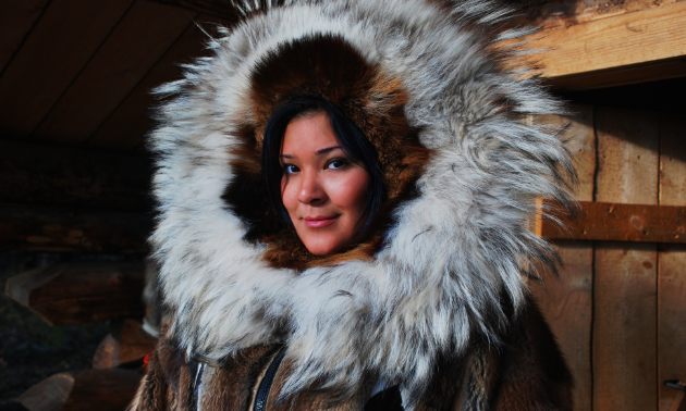 A Native Alaskan smiles for a photo