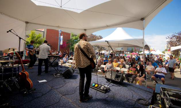 A band performs on stage.