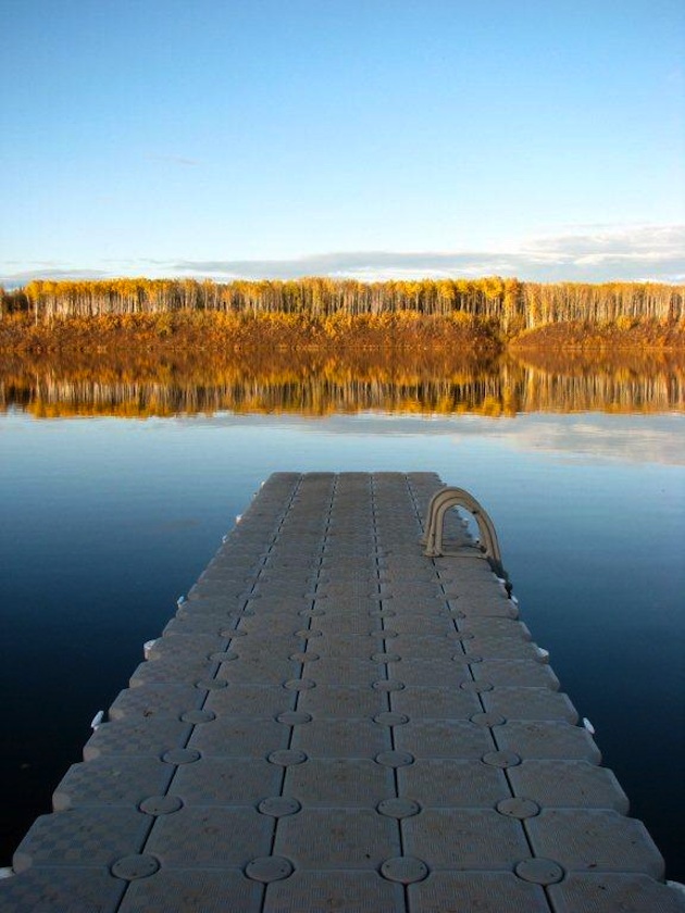 Picture of a wharf going out over a lake. 