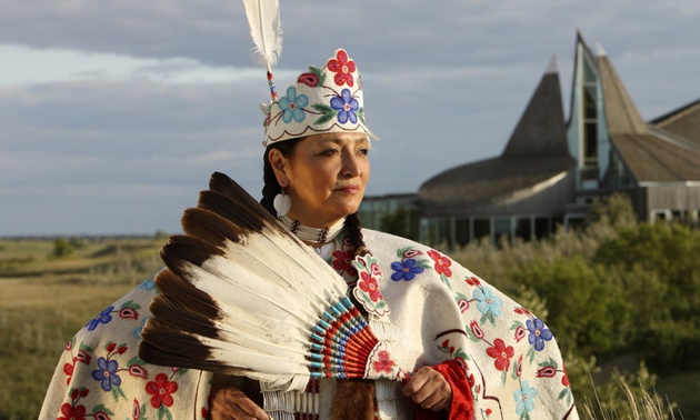 Native women in full costume.