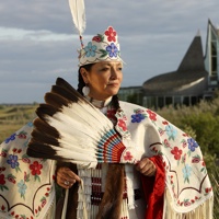 Native women in full costume.