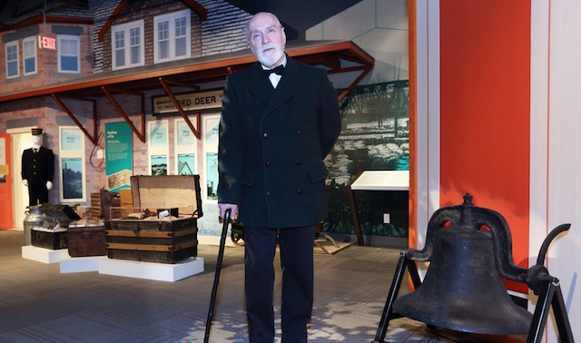 Rev. Leonard L. Gaetz (costumed interpreter) in front of the Red Deer Museum + Art Gallery train station.