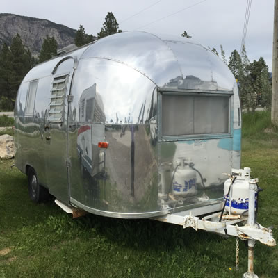 A shiny Airstream trailer. 