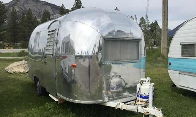 A shiny Airstream trailer. 