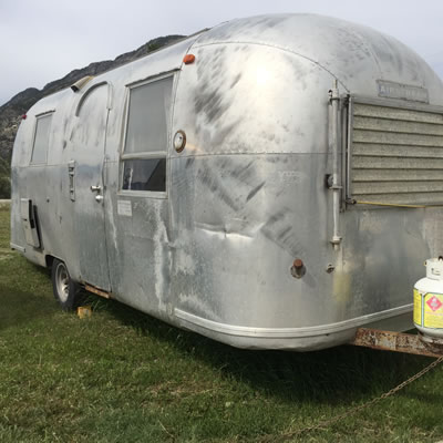 Picture of shiny silver Airstream trailer. 