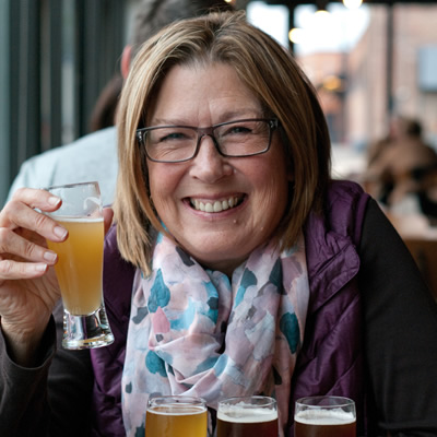 Kathy, my flight partner of decades, takes off with a wheat beer. 