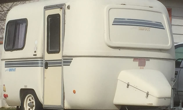 Lil Bigfoot travel trailer, sitting on lawn. 