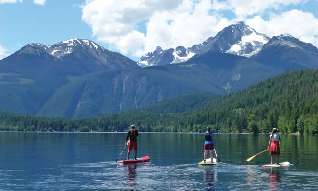 Boaters and paddle boarders alike enjoy the scenic lakes that surround Lillooet.