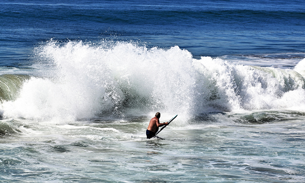 Dan Goy takes to the surf with his boogie board at Todos Santos.