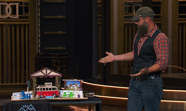 Woods on stage at Dragons' Den.
