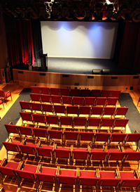 Empty chairs and a stage at the historic Bailey Theatre in Camrose, Alberta.