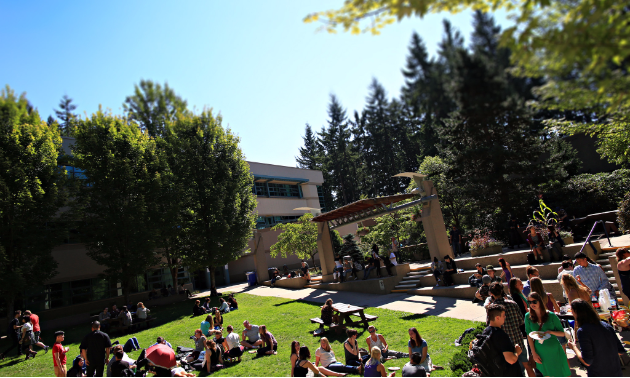 Students enjoy a balmy day on the Capilano University campus in North Vancouver.