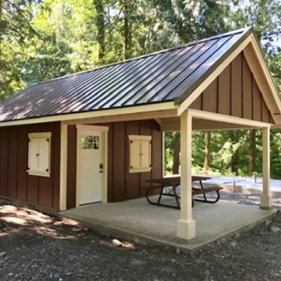 New cabin at Cultus Lake Campground, painted brown and yellow. 