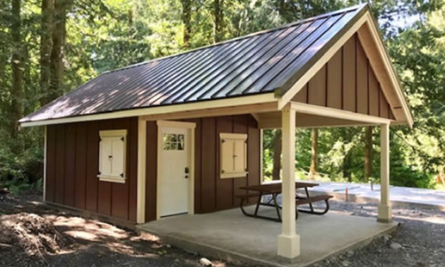 New cabin at Cultus Lake Campground, painted brown and yellow.