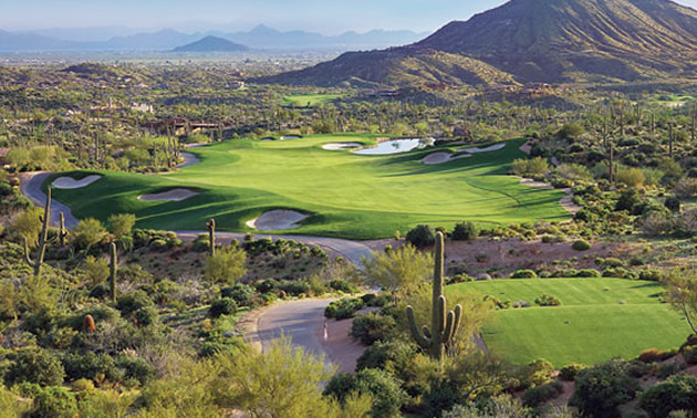 Overview of Desert Mountain Golf Club, showing the golf course and surrounding landscape.