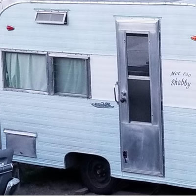 Outside of restored Esta Villa trailer. 