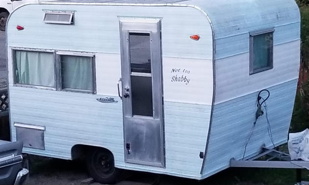 Outside of restored Esta Villa trailer. 