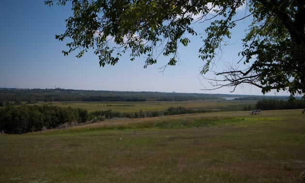 View from Eieling Kramer Municipal Campground in Battleford, Saskatchewan showing expanse of grassland and rolling hills.