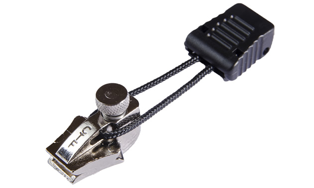 Plastic black clip with a small cord looped through a stainless steel attachment for a zipper