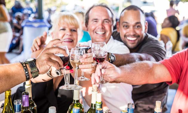 Participants cheers at the Fredericksburg Food and Wine Fest.