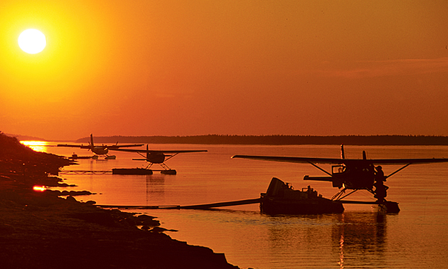 Float planes land at the docks on the Mackenzie River