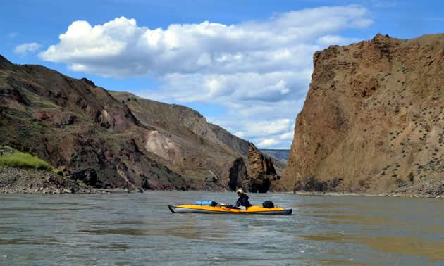 A Kayaker on the mighty Fraser River in British Columbia.