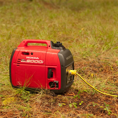 Picture of red and black Honda generator. 