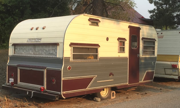 Picture of a Golden Falcon trailer on a street. 