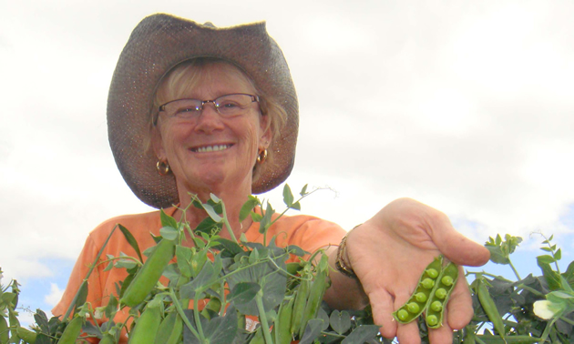 Elna Edgar with her freshly picked peas.