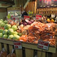 Innisfail Growers' booth at a farmers market.