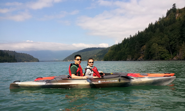 A couple of Kayakers on Harrison River in British Columbia.