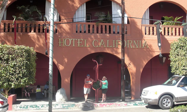 Dan and Lisa Goy standing in front of the Hotel California. 