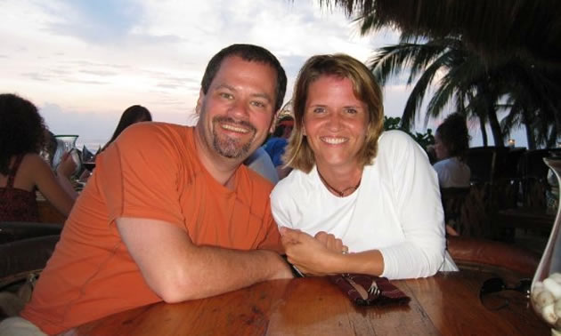 Jim and Melinda Tanner on vacation in a tropical destination.