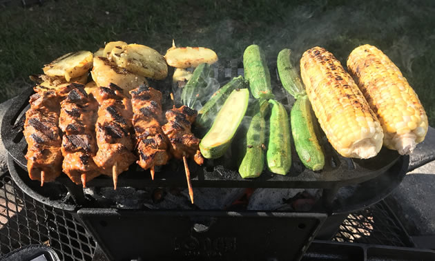 A fully stacked Lodge Sportsman’s Grill leads to much anticipation.