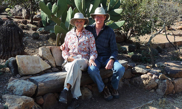 Kevin and Ruth Read sitting in front of a cactus in Mexico