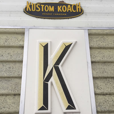 Close-up of the Kustom Koach logo. 