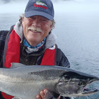 Larry Stefanyk of Campbell River, B.C., with a large, silver salmon