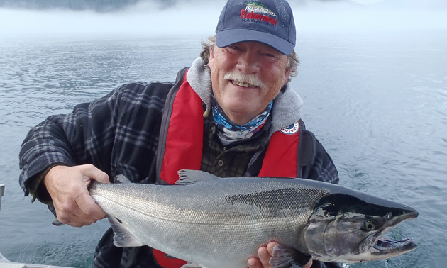 Larry Stefanyk of Campbell River, B.C., with a large, silver salmon