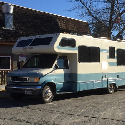 Laze Daze motorhome, parked on street. 